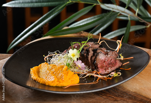 Fototapeta Naklejka Na Ścianę i Meble -  Haute cuisine/Asian fusion, roasted beef fillet with purree