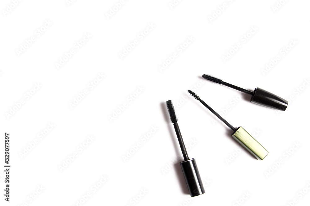 different female cosmetics on a white background different female cosmetics on a white background