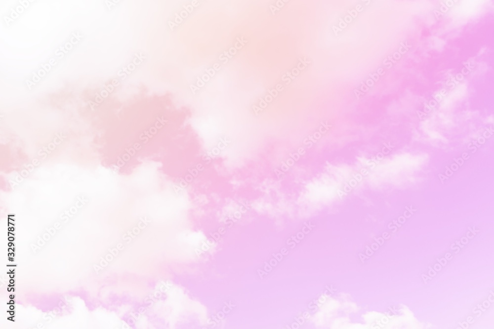 Pastel sky background. Pink sky with fluffy clouds