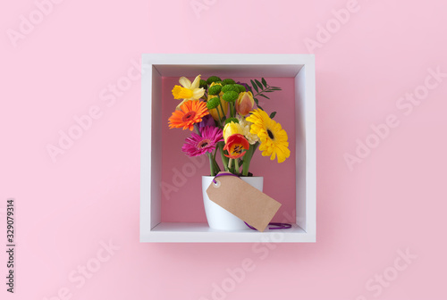 Spring flowers with gift label