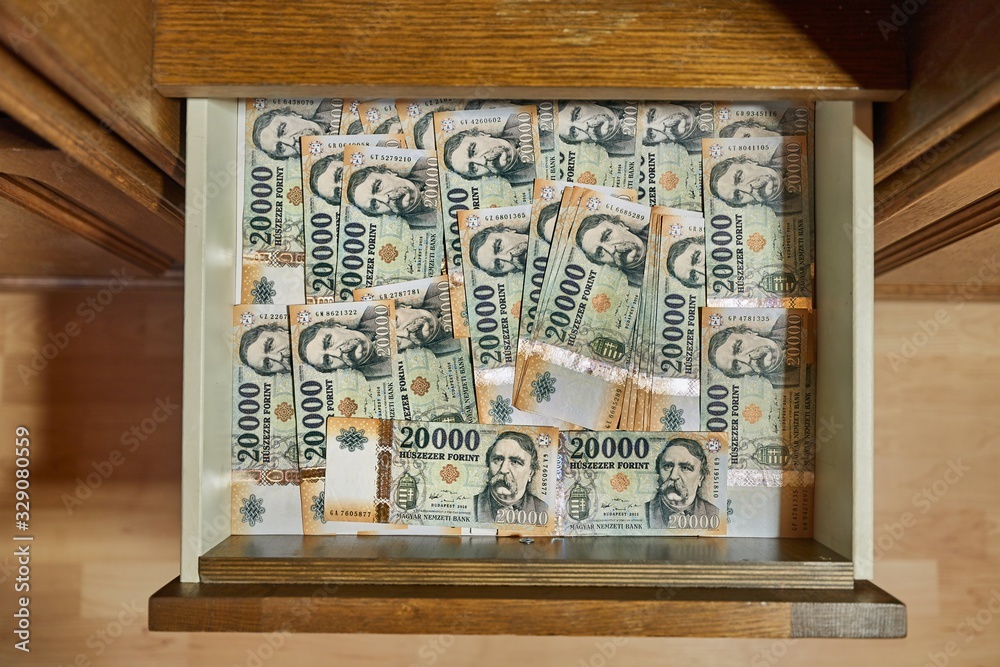 Cash money banknotes in a drawer Hungarian Forints in a pile