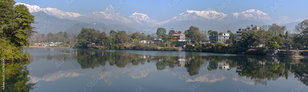 The Machapuchare and Annapurna range seen from Phewa lake in Pokhara, Nepal