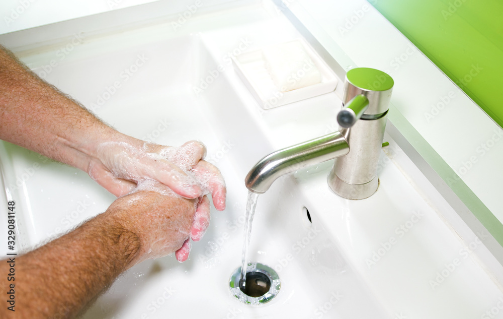 Man washing his Hands to prevent virus infection and clean dirty hands Man washing his Hands to prevent virus infection and clean dirty hands
