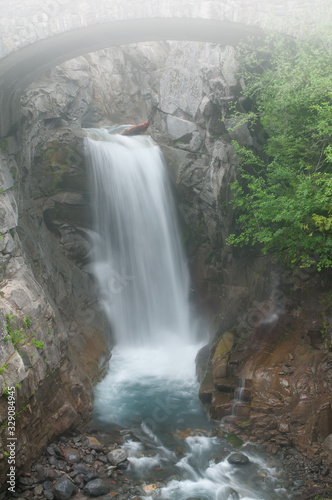 Landscape of Christine Falls in fog captured with motion blur, Mt. Ranier National Park, Washington, USA