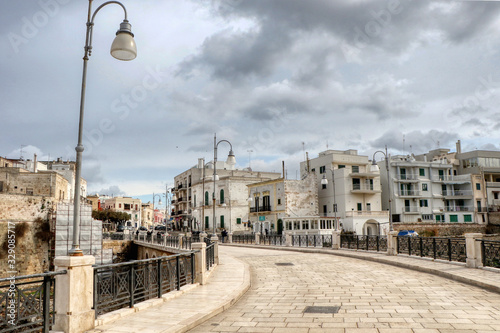 Overview of the Lama Monachile bridge in Polignano a Mare, Puglia, Italy photo