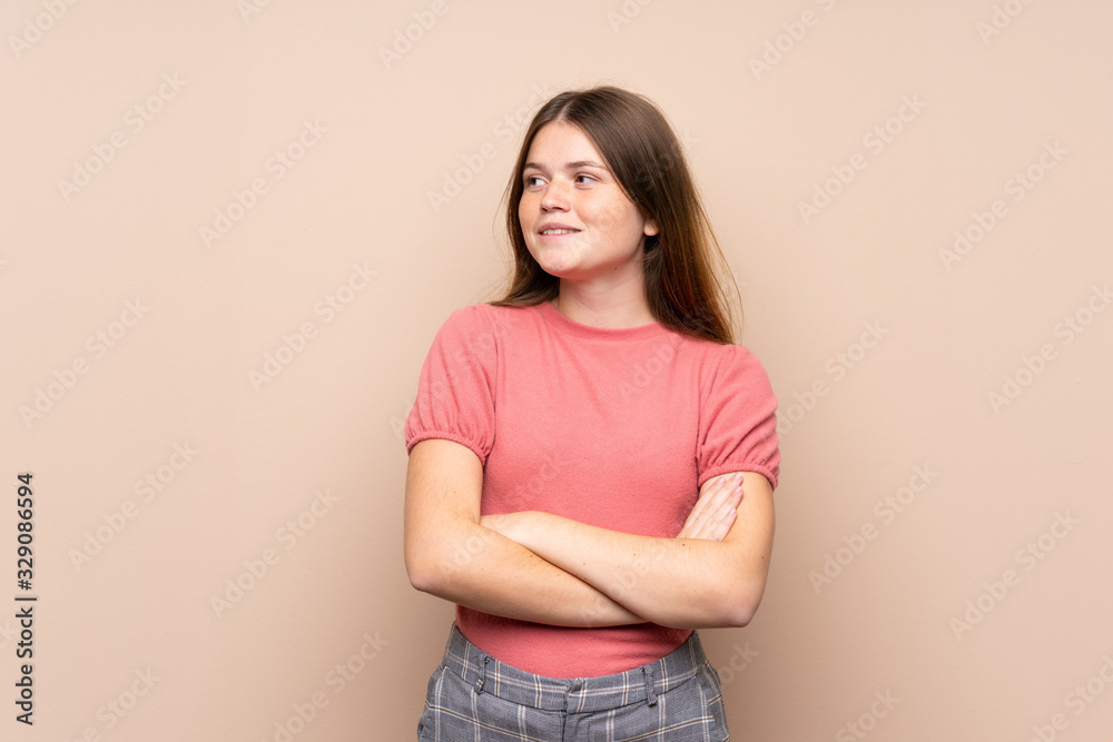 Ukrainian teenager girl over isolated background laughing Ukrainian teenager girl over isolated background laughing