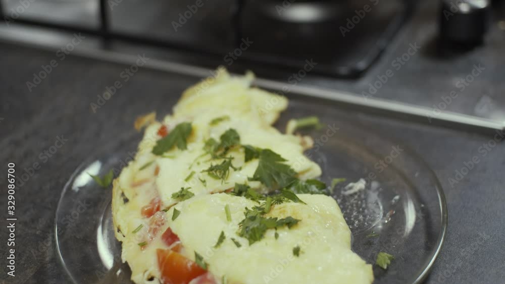custom made wallpaper toronto digitalOmelette on plate, seasoning with greens, slow motion, shallow depth of field