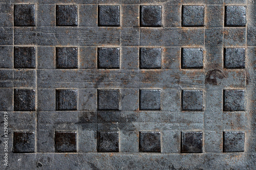 Square manhole cover texture. Top view.