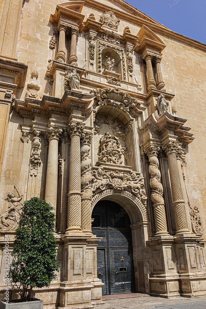 Elche Santa Maria Basilica (XVII century) at Plaza de Santa Maria is built on the foundations of old mosque. Architectural fragments of Venetian baroque facade of Santa Maria Basilica. Elche, Spain.