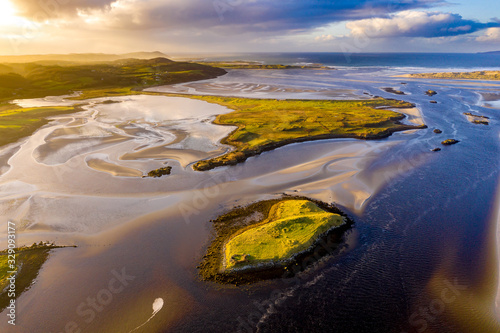 The paradisiac coast between Lettermacaward and Portnoo in County Donegal - Ireland. photo