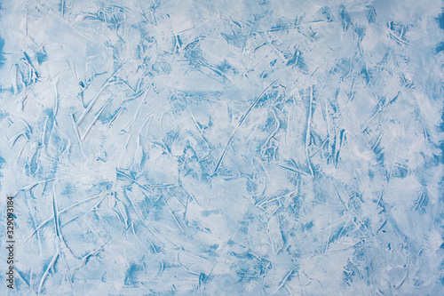 Textural blue with white background made of blue and white paint. Water-based putty swabs