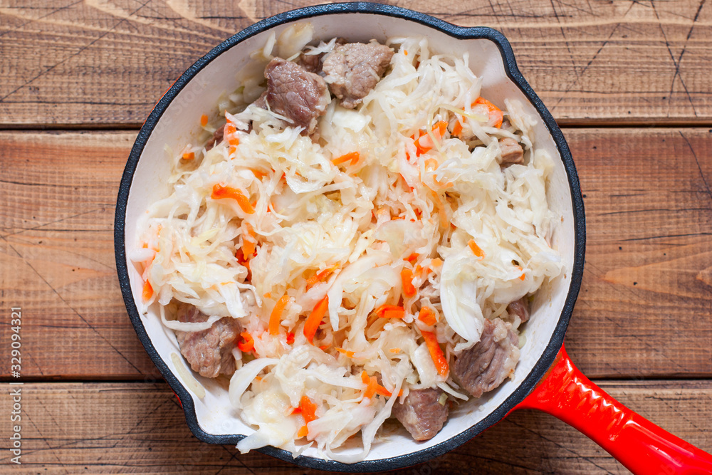 Stepbystep cooking sauerkraut stew with meat, step 4 adding