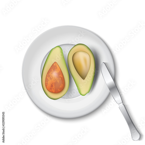 halves of fresh avocado on a plate