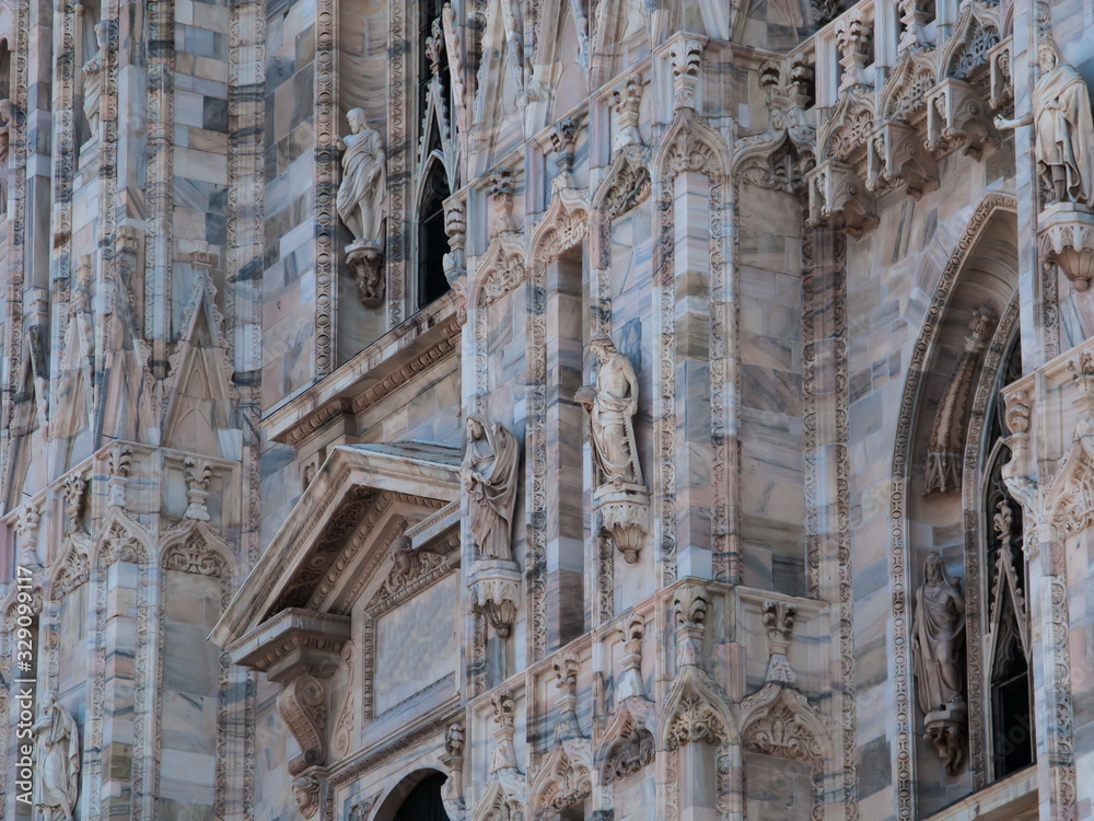 close-up marble sculptures on the walls of Duomo di Milano, Milan, Lombardy, Italy close-up marble sculptures on the walls of Duomo di Milano, Milan, Lombardy, Italy