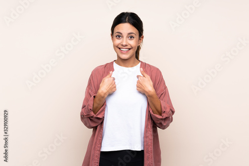 Woman over isolated background with surprise facial expression