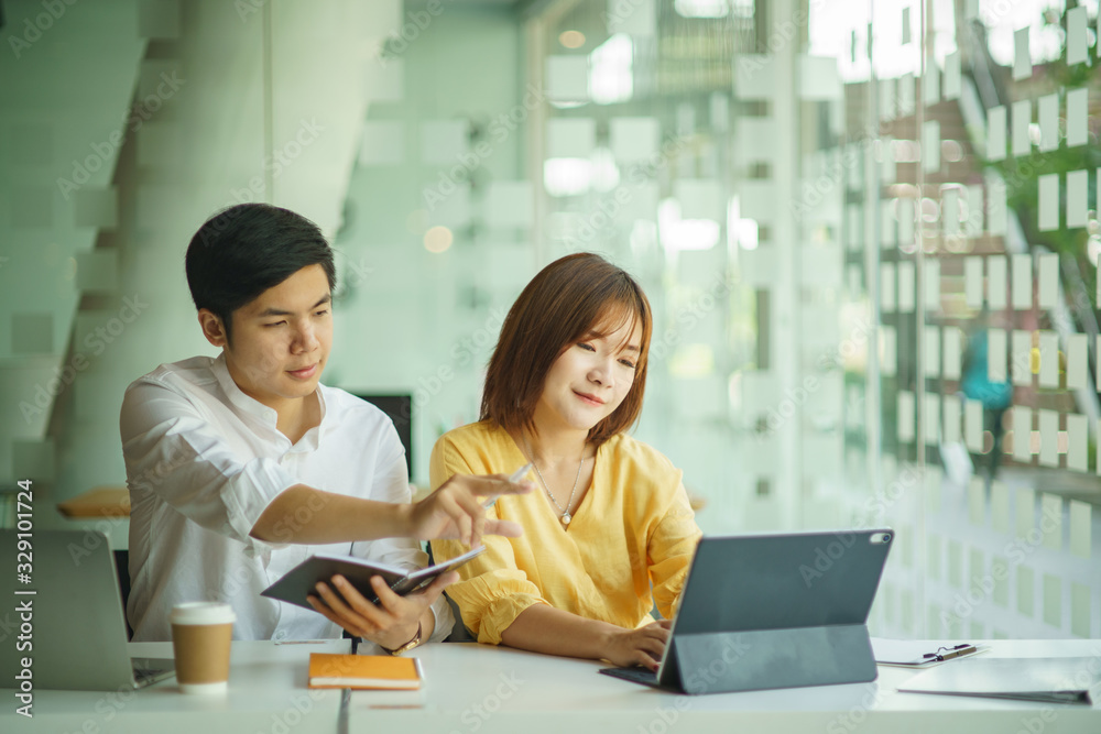 Young business teamwork working with business report document on office desk.Brainstorming Business People Design Planning,Brainstorming Planning Partnership.	