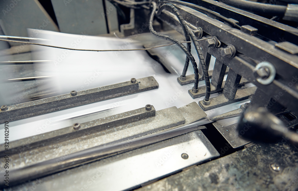 A industrial commercial envelope making machine, making paper envelopes