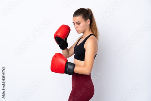 Teenager sport girl over isolated white background with boxing gloves