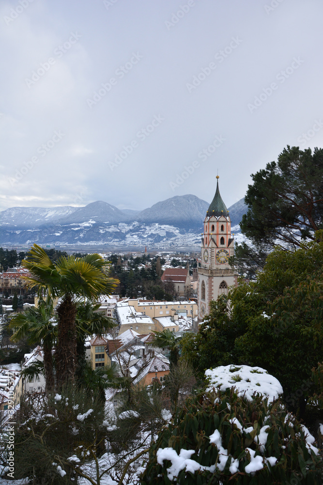 The beautiful Alpine town of Meran / Merano in south Tyrol, covered in snow in the winter. The beautiful Alpine town of Meran / Merano in south Tyrol, covered in snow in the winter.