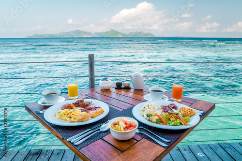 Breakfast on the beach by the pool with a look over the ocean of La Digeu Seychelles 