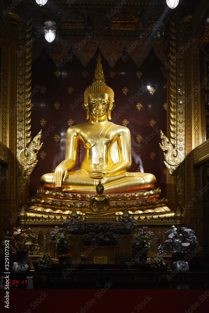 Buddha's statue in golden building at Mae Sot, Thailand Buddha's statue in golden building at Mae Sot, Thailand
