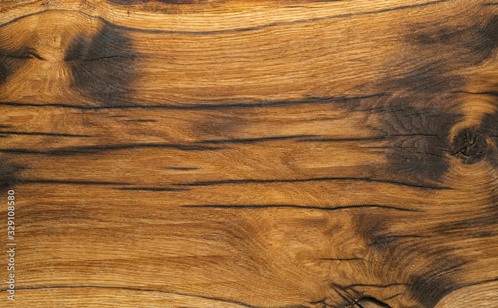 Fototapeta premium Old roughly processed board from an oak wood. Texture