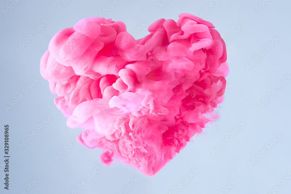 Love is in the air. Pink Heart Shaped Cloud with blue background. Valentine's Day Concept