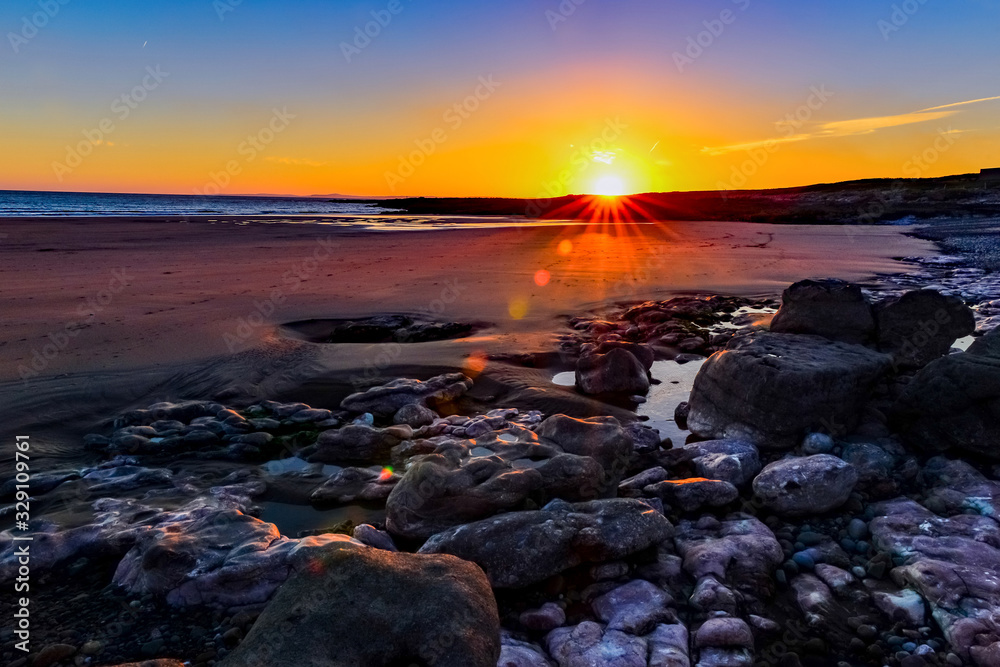 Summer Solstice Sunset on Pink Bay, Porthcawl, wales Summer Solstice Sunset on Pink Bay, Porthcawl, wales
