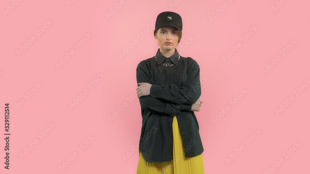 model in studio wears a hip-hop influenced look model in studio wears a hip-hop influenced look