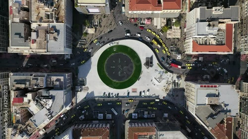 Aerial drone video of recently renovated fountain of famous round square of Omonia in the heart of Athens centre, Attica, Greece photo