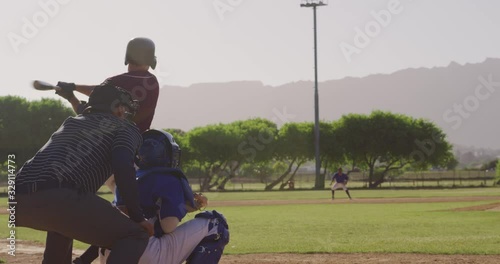 Baseball player hitting a ball during a match