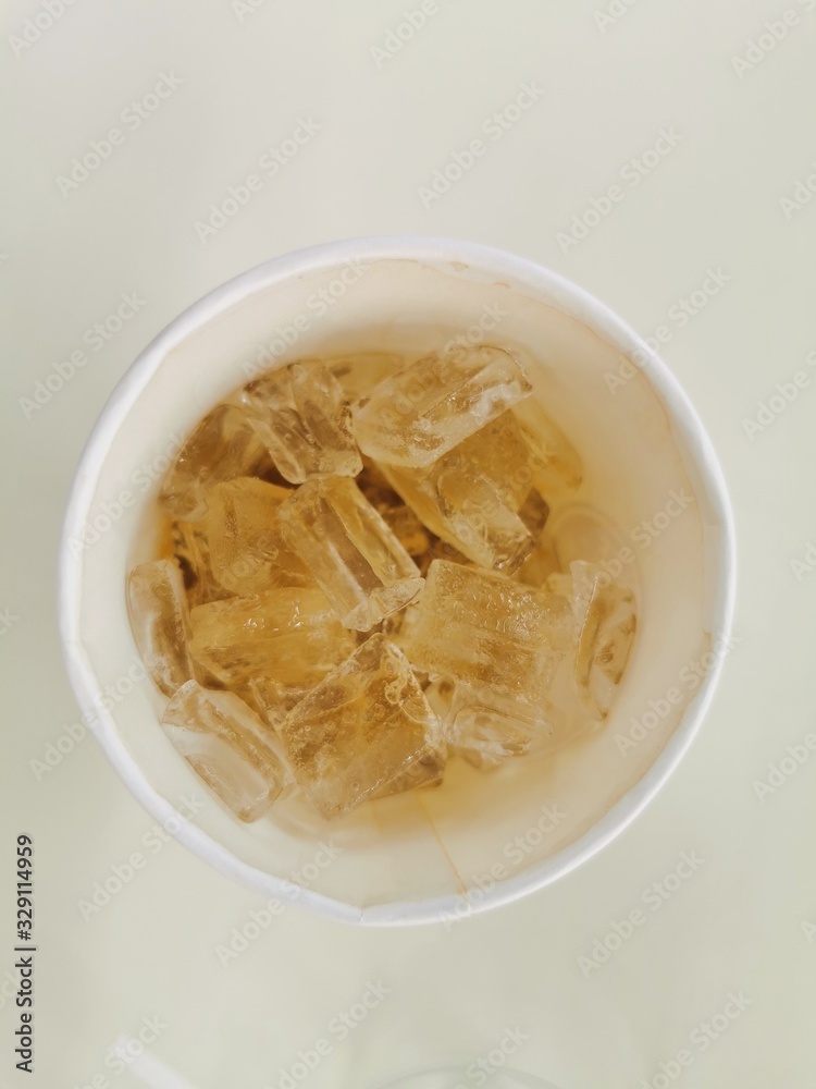 Coffee and Ice in cup. Coffee and Ice in cup.