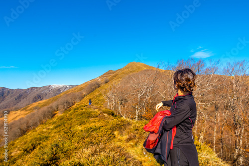 A young woman climbing Mount Ekaitza in Navarra photo