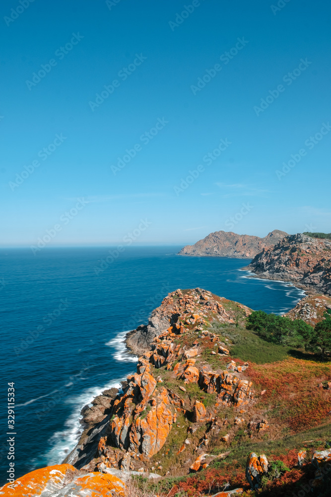 Cliffs and sea with waves in the Cies Islands, Galicia, Spain.