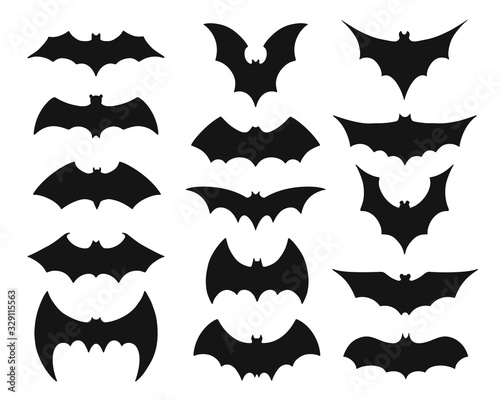 Collection of black bat silouettes or symbols photo