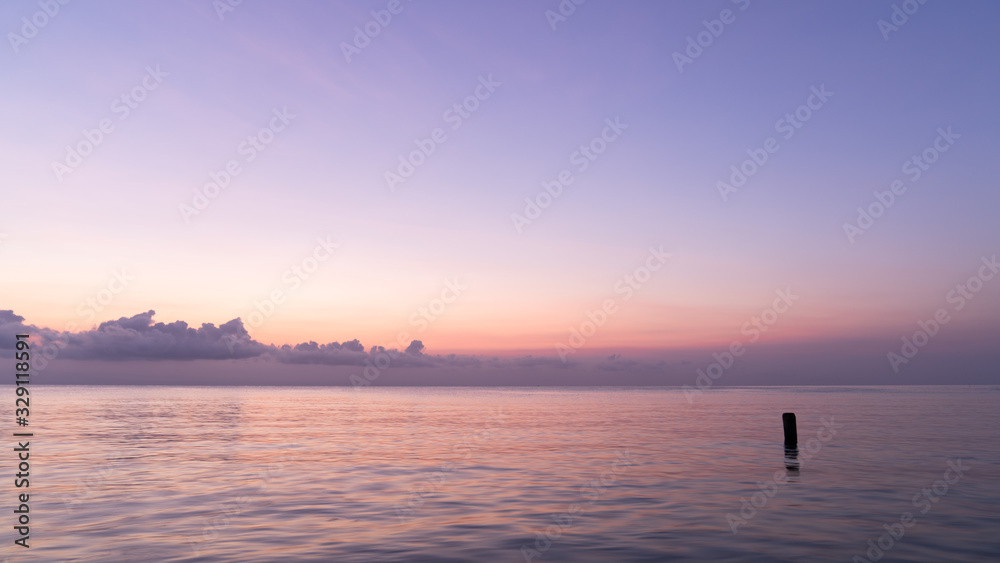 Beautiful sea and sky view with the sunset for the background.