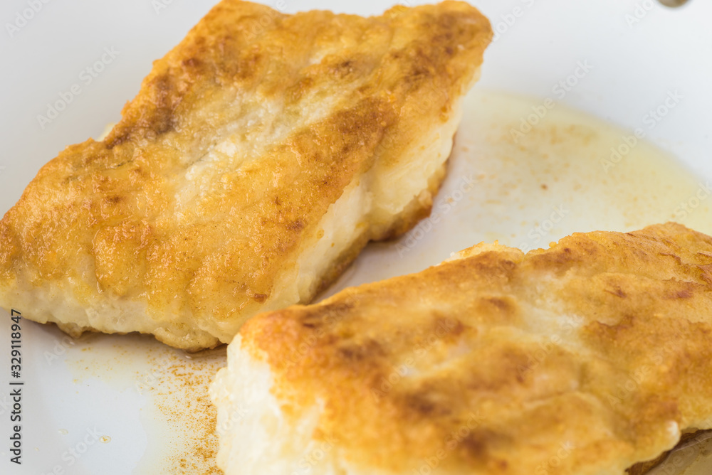 Fried light breaded cod fish. Fried light breaded cod fish.