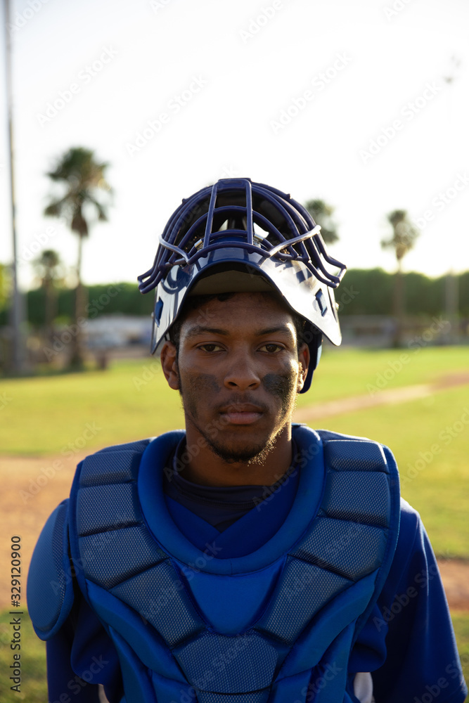 African American Baseball player looking at camera
