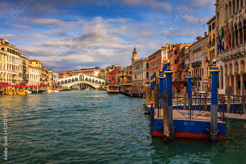 Rialto bridge in Venice, Italy. Venice Grand Canal. Architecture and landmarks of Venice. Venice postcard with Venice gondolas © daliu