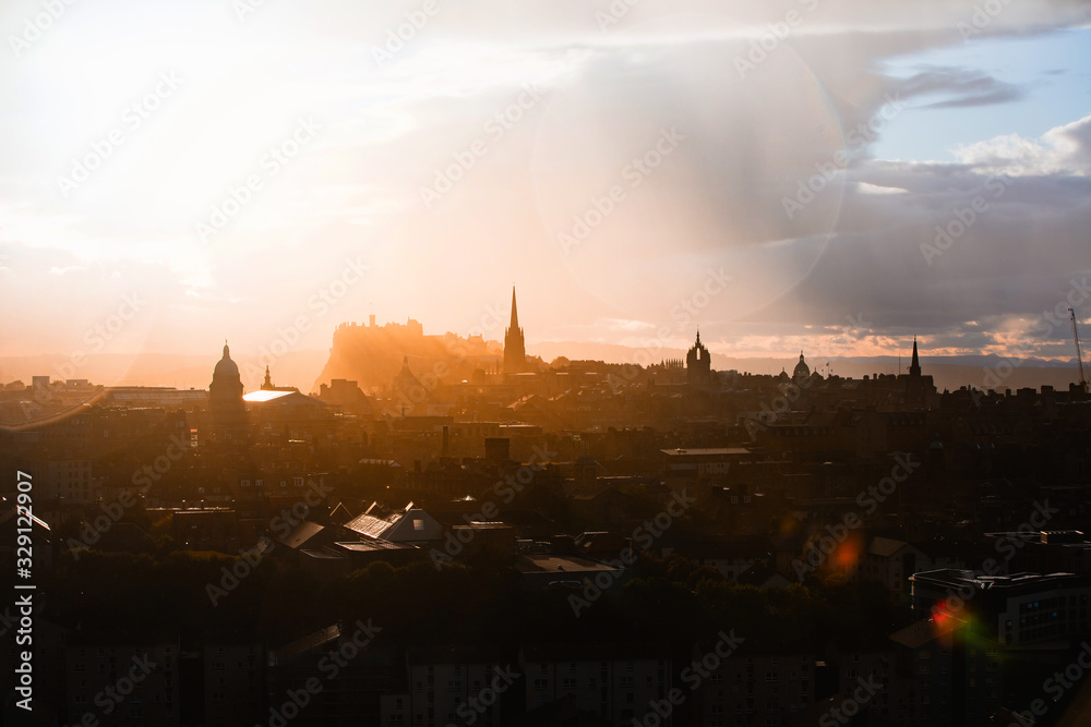 Sunset overlooking the beautiful city and castle of Edinburgh in Scotland