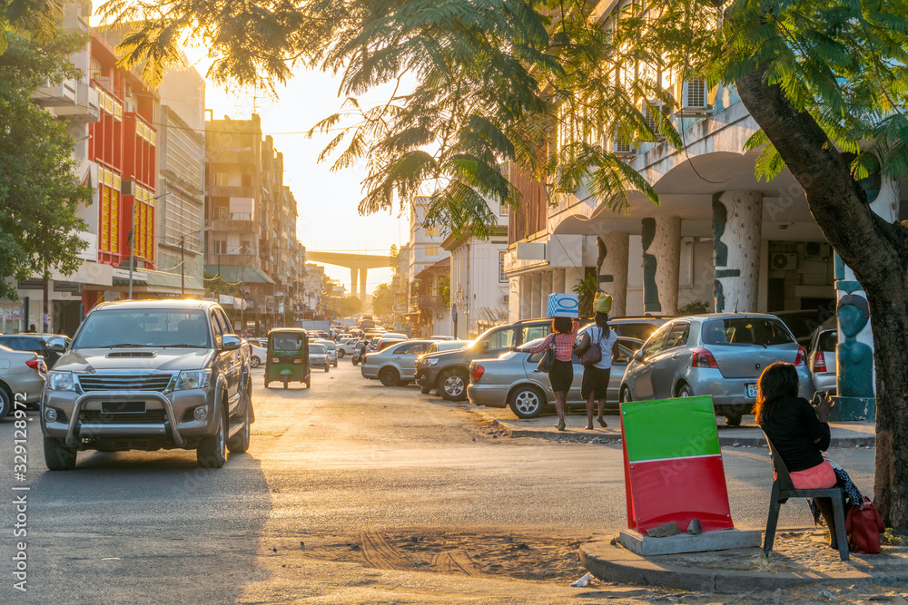 Fototapeta premium Regular car and human traffic on the street of Maputo, Mozambique