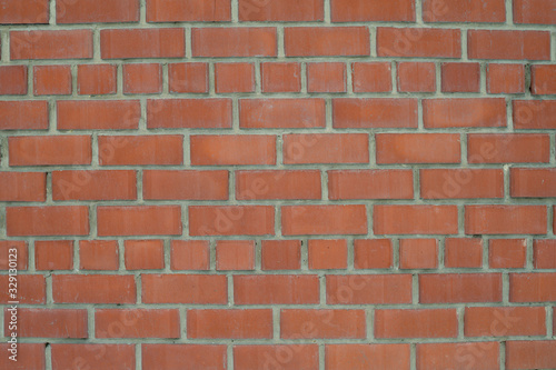 The texture of the brickwork of red brick. Structure, the outer part of the wall.