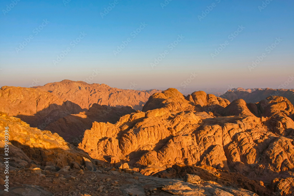 Amazing colorful sunrise on Mount Sinai, rich colors, beautiful sunrise in Egypt, beautiful view from Mount Sinai, Mount Moses.