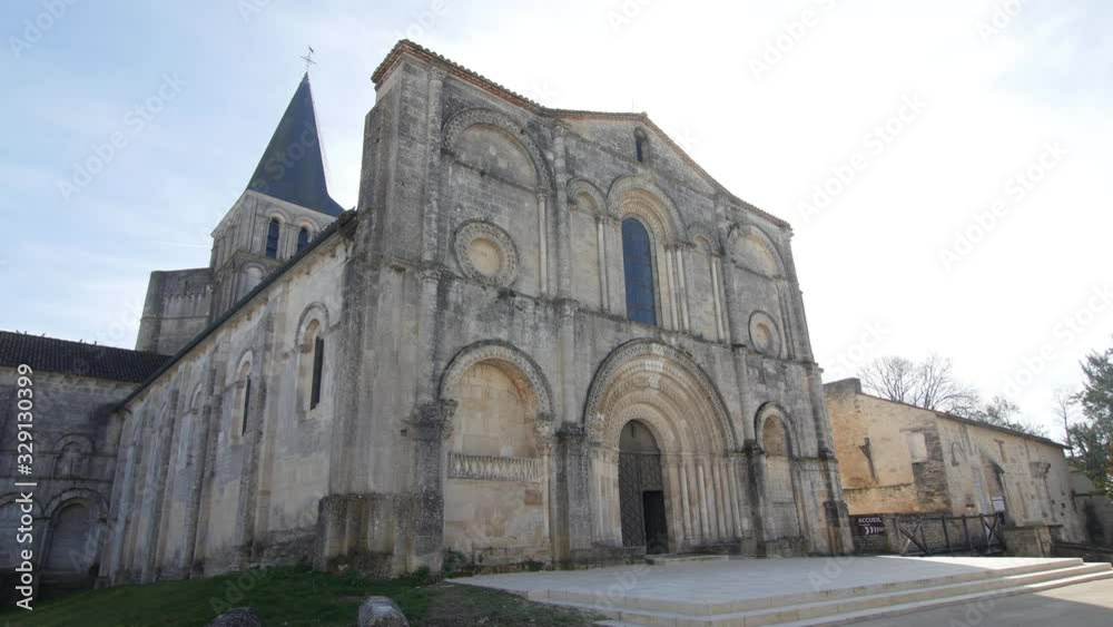 beautiful view of ancient church of Saint Amant de Boixe, France, 6.3.2020 The abbey of Saint-Amant-de-Boixe owes its origin to the hermit Amant, who would have lived in the 6th century in the forest beautiful view of ancient church of Saint Amant de Boixe, France, 6.3.2020 The abbey of Saint-Amant-de-Boixe owes its origin to the hermit Amant, who would have lived in the 6th century in the forest
