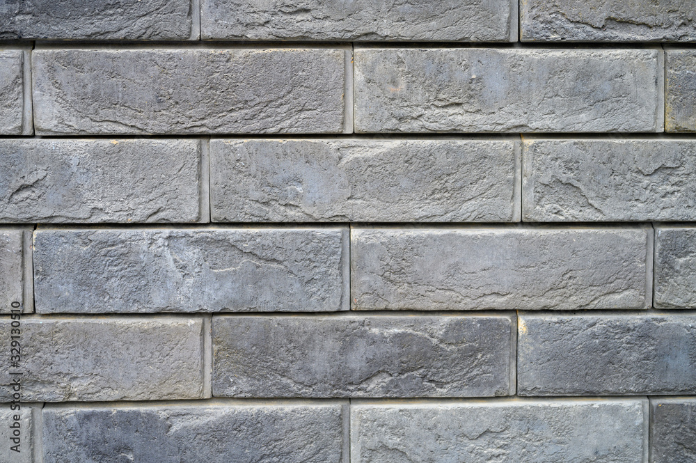 pattern of decorative gray slate stone wall surface as a background
