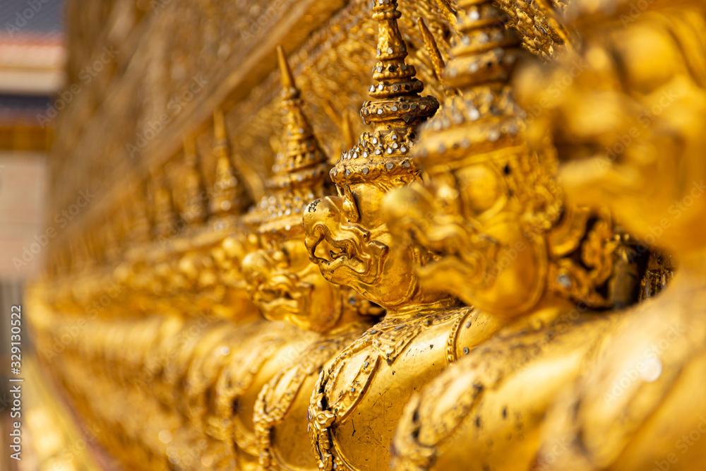 Fototapeta premium Many Garuda statues. It is an animal in the Himmapan myth of Thailand. It is decorated around the chapel of Wat Phra Kaew , Bangkok ,Thailand