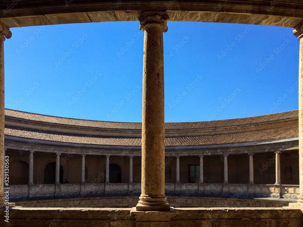 Fototapeta premium Granada, Andalusia / Spain - March 27 2015: Beautiful Infamous Alhambra Moorish Sprawling Hilltop Royal Fortress Complex