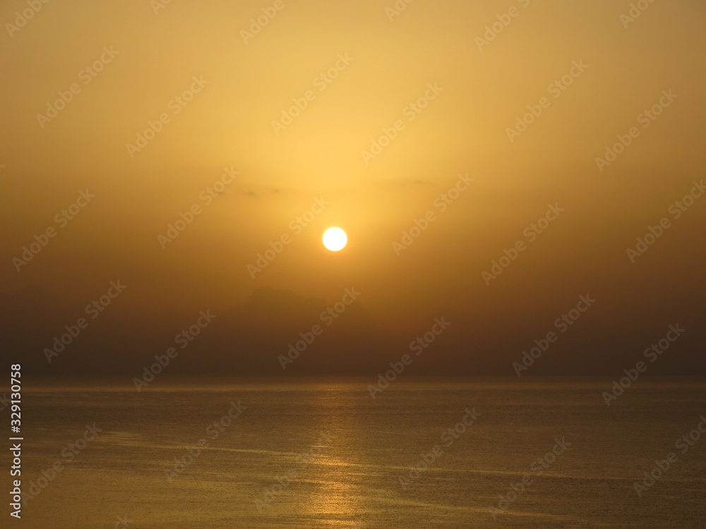 Colorful sunny sunset on the background of the Mediterranean Sea in Turkey
