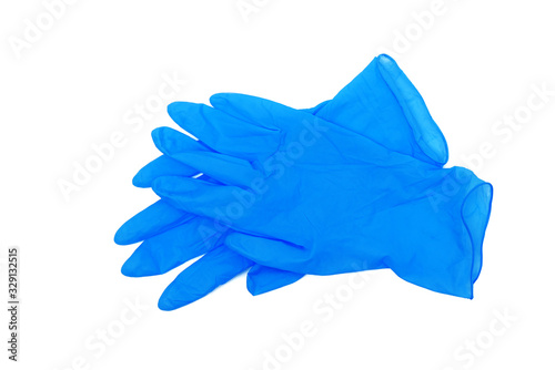 pair of blue medical gloves isolated on white background photo