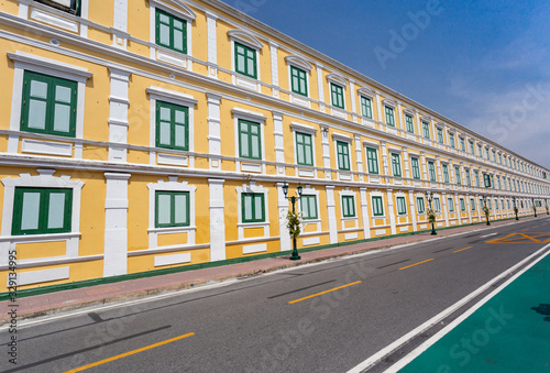 Empty Road beside window and wall of Thai Ministry of Defence building, yellow wall,one of Thailand landmark © TRYMAN
